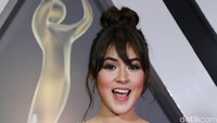 Raisa berhasil membawa pulang tujuh piala mulai dari kategori Artis Kolaborasi Pop Terbaik hingga Artis Solo Wanita Pop Terbaik. Pool/Palevi S/detikFoto.