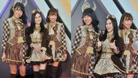 JKT 48 juga turut hadir dengan busana dengan nuansa warna coklat serta boots hitam tinggi. Pool/Noel/detikFoto.