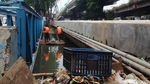 Melihat Pasukan Oranye Membersihkan Sungai