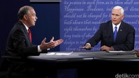 Cawapres Partai Demokrat Tim Kaine (kiri) dan cawapres Partai Republik Mike Pence berdebat sengit soal berbagai isu, termasuk kompetensi masing-masing capres. REUTERS/Jonathan Ernst.
