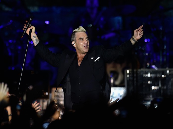 MONACO - JULY 12:  Robbie Williams performs onstage during the Second Day of the 10th Anniversary on the Throne Celebrations on July 12, 2015 in Monaco, Monaco.  (Photo by Pascal Le Segretain/Getty Images)