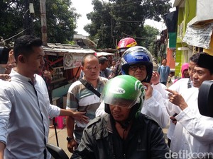Ojek Online dan Helm Nolan Milik Anies Baswedan
