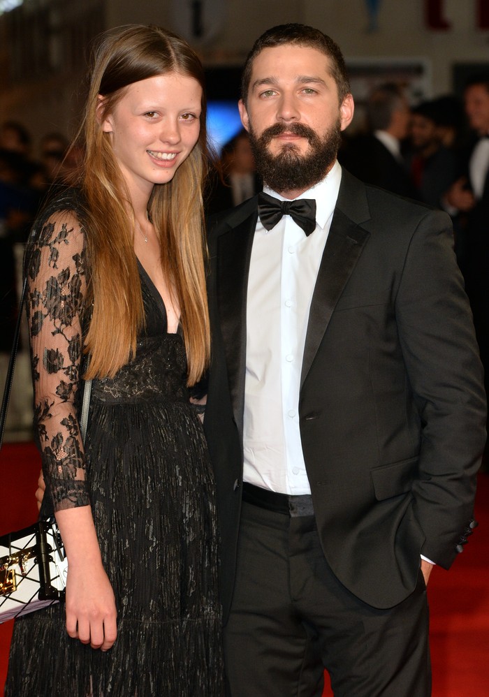 LONDON, ENGLAND - OCTOBER 19:  Mia Goth and Shia LeBeouf attend the closing night European Premiere gala red carpet arrivals for Fury during the 58th BFI London Film Festival at Odeon Leicester Square on October 19, 2014 in London, England.  (Photo by Anthony Harvey/Getty Images for BFI)