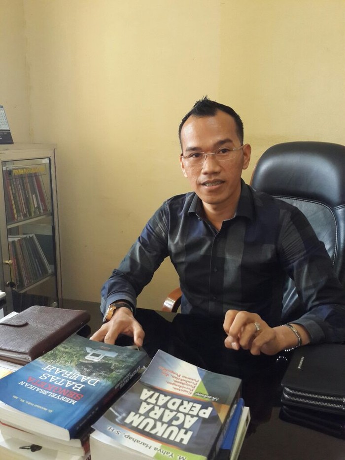 Kegigihan Bripka Rudi, Polisi Pekanbaru Peraih Doktor Hukum