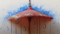 Sebuah instalasi seni dengan dekorasi payung. Para pengrajin di sini menyediakan jasa melukis casing ponsel lho (Fitraya/detikTravel)