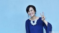Ibu dan anak itu tampil dalam busana biru. Pool/Noel/detikFoto.