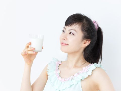 Japanese woman drinking milk