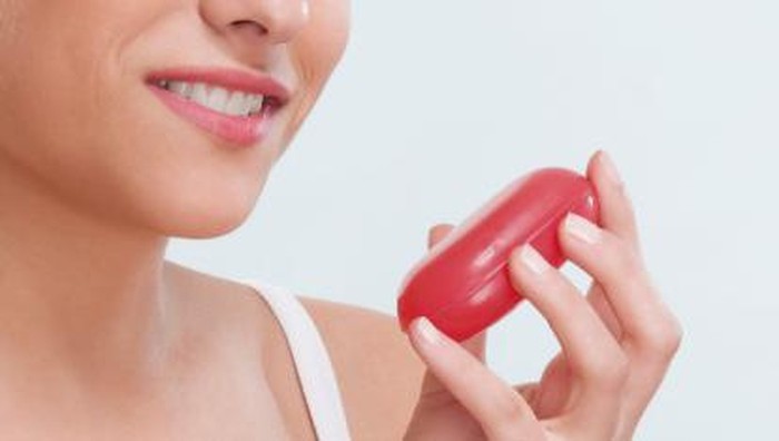 Sabun Close-up of a woman holding a bar of soap