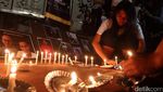 Aksi Lilin Terkait Kasus JIS
