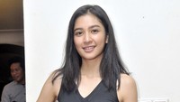 Senyum manisnya kala berpose di depan kamera. Pool/Noel/detikFoto.