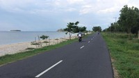 Foto: Jalan raya ini tampak masih mulus dan bebas dari lubang. Jadi perjalanan pun terasa nyaman (Ahmad Masaul Khoiri/detikTravel)