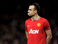 Pada 2008, Tottenham setuju menjual Dimitar Berbatov ke Manchester City, tetapi ketika sang striker terbang ke Manchester malah disambut oleh Alex Ferguson. Itu tidak menguntungkan untuk Spurs, karena tawaran City lebih baik, tetapi Berbatov ingin bergabung dengan United. (Foto: Michael Regan/Getty Image)