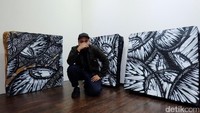 Tak seperti seniman lainnya, lewat karakter monster hitam-putih Darbotz tetap memakai tembok bukan kanvas.
