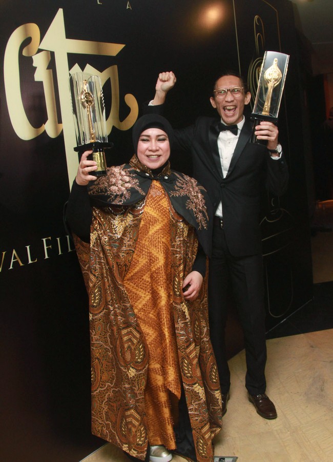 Inilah penampilan Melly Goeslaw dan suaminya, Anto Hoed, pada 2016. (Foto: Gus Mun/detikHOT)