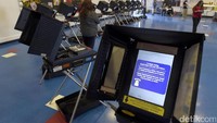 Sebagian TPS menggunakan mesin elektronik. David Becker/Reuters/detikFoto.