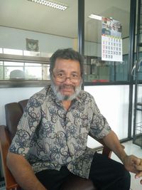 Edward L Poelinggomang