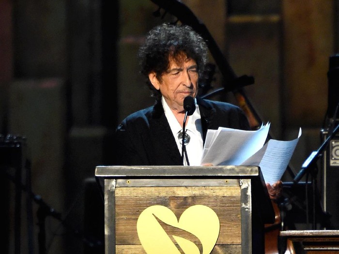 Bob Dylan LOS ANGELES, CA - FEBRUARY 06: Honoree Bob Dylan speaks onstage at the 25th anniversary MusiCares 2015 Person Of The Year Gala honoring Bob Dylan at the Los Angeles Convention Center on February 6, 2015 in Los Angeles, California. The annual benefit raises critical funds for MusiCares Emergency Financial Assistance and Addiction Recovery programs. (Photo by Frazer Harrison/Getty Images)
