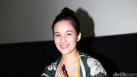 Senyuman manisnya dijamin bikin luluh. Pool/Palevi S/detikFoto.