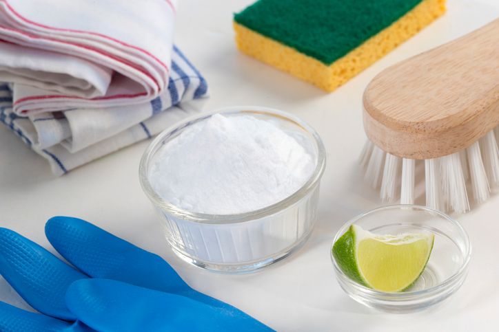 baking soda Eco-friendly natural cleaners Vinegar, baking soda, salt, lemon and cloth on wooden table Homemade green cleaning