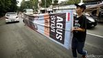 Spanduk Cagub-Cawagub DKI Hiasi Jalan Wijaya