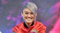 Agnez Mo terlihat happy saat menghadiri acara tersebut. Pool/Noel/detikFoto.