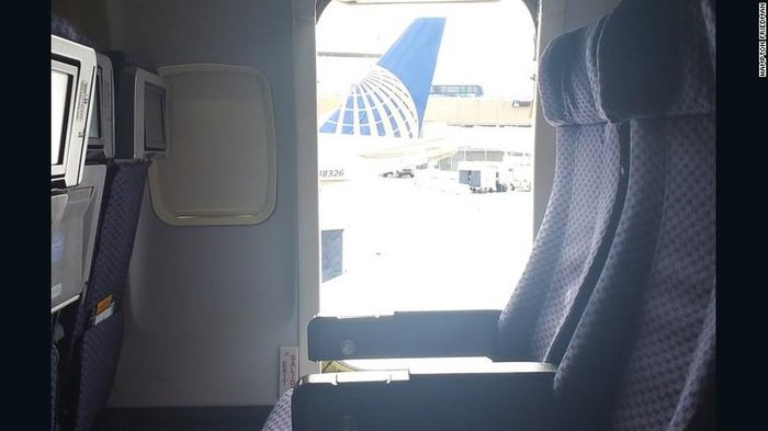 A woman opened the emergency exit door and jumped out of a plane as it was taxiing down a runway in Houston, startling passengers on board. (Hampton Friedman/CNN)