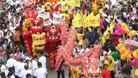 Aksi tersebut digelar di Bundaran HI, Jakarta, Minggu (4/12).