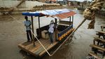 Potong Kompas Dengan Perahu Eretan