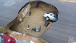 Foto: Sinkhole Tiba-tiba Muncul di Jalanan Wales