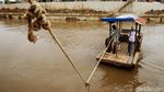 Potong Kompas Dengan Perahu Eretan