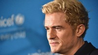 Siapa coba yang tak jatuh cinta pada pria yang sayang anak? Mike Coppola/Getty Images/detikFoto.