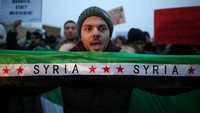 Warga Jerman juga memprotes penyerangan Kota Aleppo yang memakan banyak korban jiwa. REUTERS/Christian Mang.