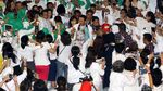 Hadiri Peringatan Hari Ibu, Ahok-Djarot Disambut Pendukung