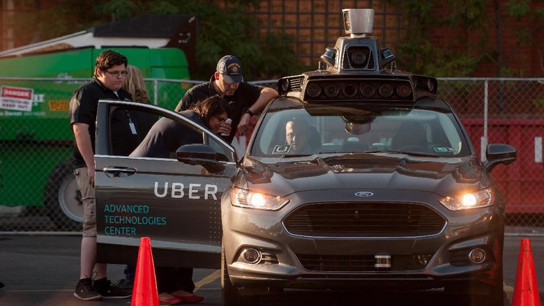 Ilustrasi mobil otonom Uber Foto: Jeff Swensen - Gettyimages Ilustrasi mobil otonom Uber Foto: Jeff Swensen - Gettyimages