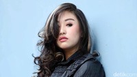 Namun jika berpose serius ia bisa mencuri hati Anda lho. Pool/Noel/detikFoto.