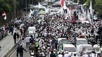 Massa memenuhi Jalan Gajah Mada di depan eks gedung Pengadilan Negeri (PN) Jakarta Pusat.