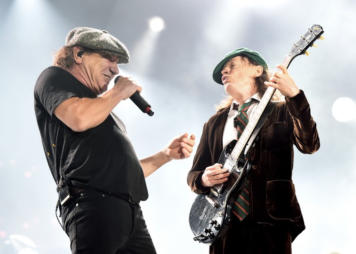 LOS ANGELES, CA - SEPTEMBER 28:  Singer Brian Johnson (L) and musician Angus Young of AC/DC perform at Dodger Stadium on September 28, 2015 in Los Angeles, California.  (Photo by Kevin Winter/Getty Images)