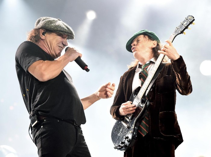 LOS ANGELES, CA - SEPTEMBER 28:  Singer Brian Johnson (L) and musician Angus Young of AC/DC perform at Dodger Stadium on September 28, 2015 in Los Angeles, California.  (Photo by Kevin Winter/Getty Images)
