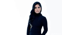Ibu satu anak itu tampil cantik dengan busana hitam ketat. Pool/Noel/detikFoto.
