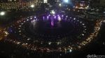 Suasana Kepadatan Perayaan Tahun Baru di Bundaran HI