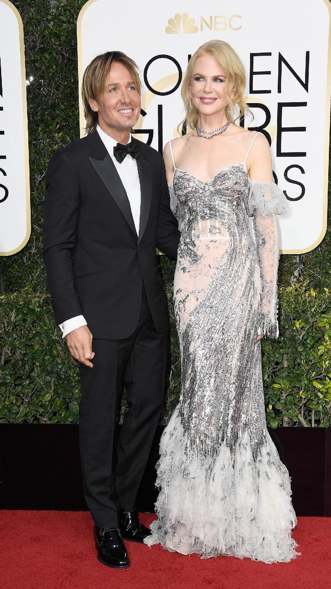 Keith Urban menikahi Nicole Kidman saat usianya 38 tahun. Kini, usia pernikahannya dengan mantan istri Tom Cruise itu telah masuk tahun ke-11. Foto: Frazer Harrison/Getty Images