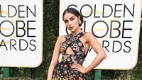 Olivia Culpo tampil dengan gaun bermotif floral. Frazer Harrison/Getty Images/detikFoto.