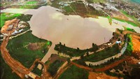 Jakabaring Sport City dibangun di atas lahan seluas lebih dari 350 hektar, yang dulunya merupakan daerah rawa-rawa. Ini adalah foto Jakabaring sebelum disulap menjadi komplek olahraga. (Foto: dok. Pemprov Sumsel)