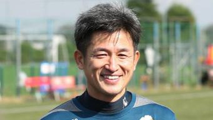 48-year-old professional football player Kazuyoshi Miura speaks to reporters as he extends his J-League career after signing a new deal with Yokohama FC in Yokohama, suburban Tokyo on November 12, 2015.  The leagues oldest player, known by his fans and local media as 