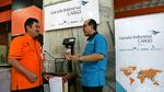 Garuda dan PT Pos Resmikan Outlet Kargo di Makassar