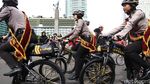 Senyum Ramah Polwan Bersepeda Bikin Adem CFD