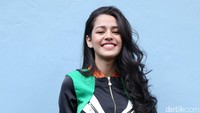 Ia selalu tersenyum kala berpose di depan kamera. Pool/Palevi S/detikFoto.