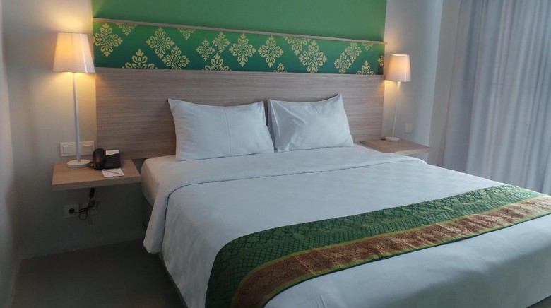 Kamar Pesonna Hotel Pekanbaru yang nyaman (Wahyu/detikTravel) Kamar Pesonna Hotel Pekanbaru yang nyaman (Wahyu/detikTravel)