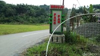 Ini jalan masuk di Agrowisata Pango-pango. Traveler hanya tinggal naik ke atas gunung dengan mengikuti petunjuk arah (Bonauli/detikTravel)