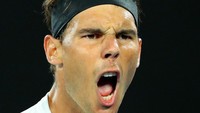 Nadal maju ke semifinal setelah menyingkirkan Milos Raonic (Kanada) dalam duel tiga set langsung. Scott Barbour/Getty Images.